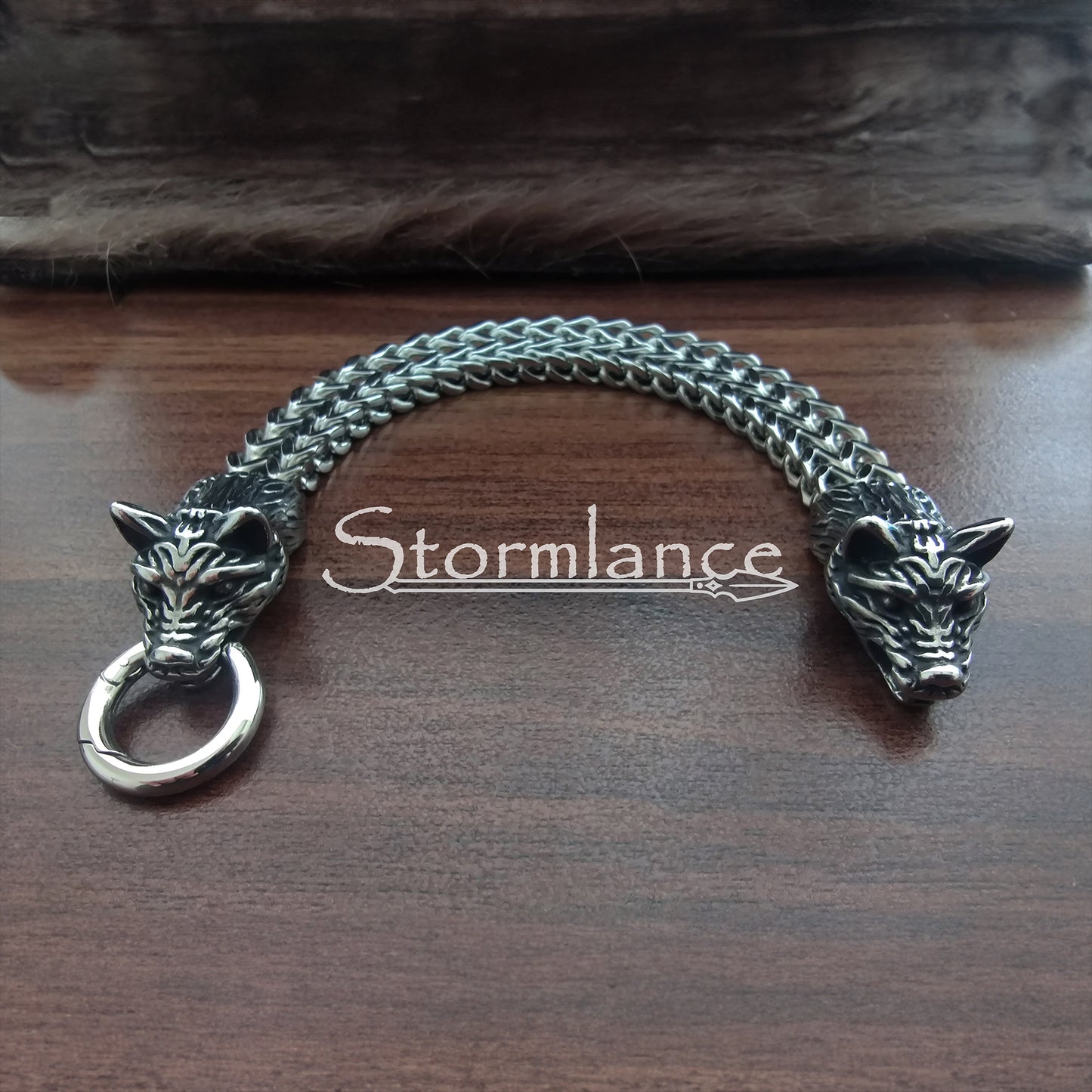 Massive Wolf Detailed Bracelet Made of Stainless Steel placed on a wooden desk