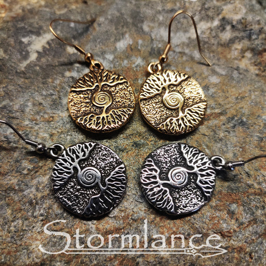 Yggdrasil (tree of life) Earrings made of stainless steel laying on a stone slab