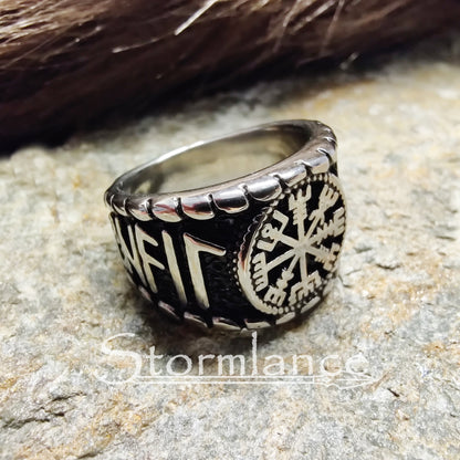 vegvisir rune ring made of stainless steel, laying on a granite stone slab